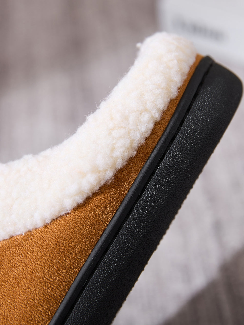 Close-up of Contrast Round Toe Flat Slippers showcasing material and design details