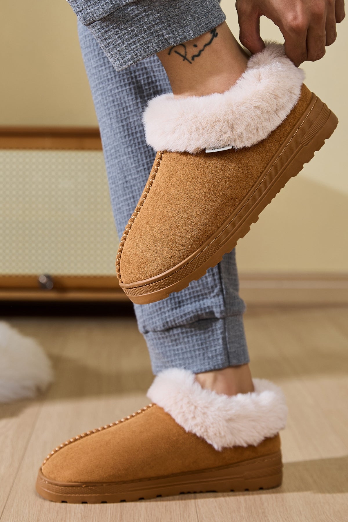 Faux Fur Round Toe Platform Slippers under soft lighting, showing their cozy faux fur and stylish design.