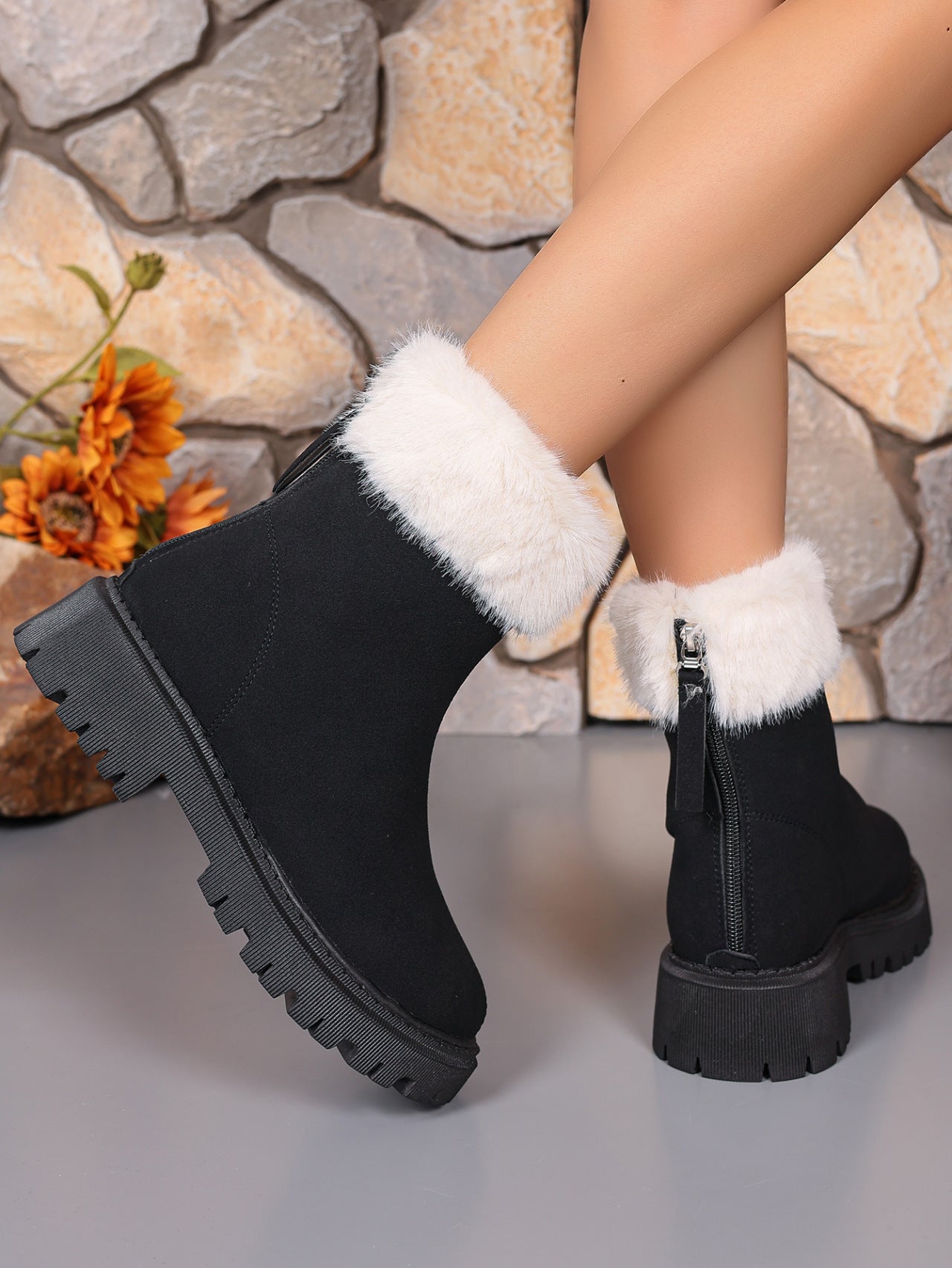 Close-up of the black Faux Fur Trim Suede Platform Boots, emphasizing the luxurious faux fur and soft suede material.