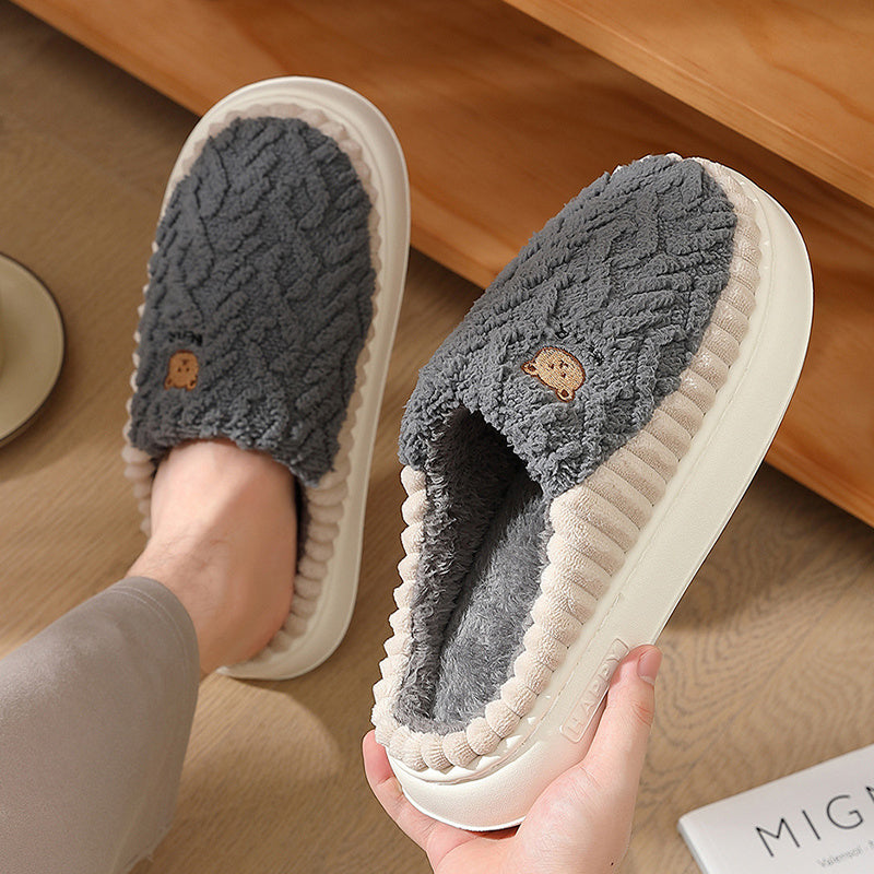 Fleece-lined cute bear slippers for women and men to keep feet warm.