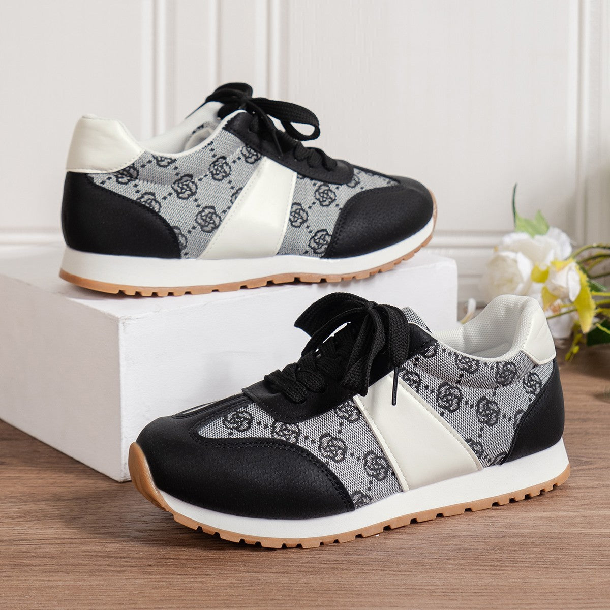 Side view of Floral Round Toe Flat Sneakers, highlighting the sleek design and floral pattern.