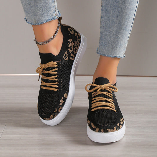 Lace-Up Leopard Flat Sneakers in black, featuring a trendy leopard print and stylish design.