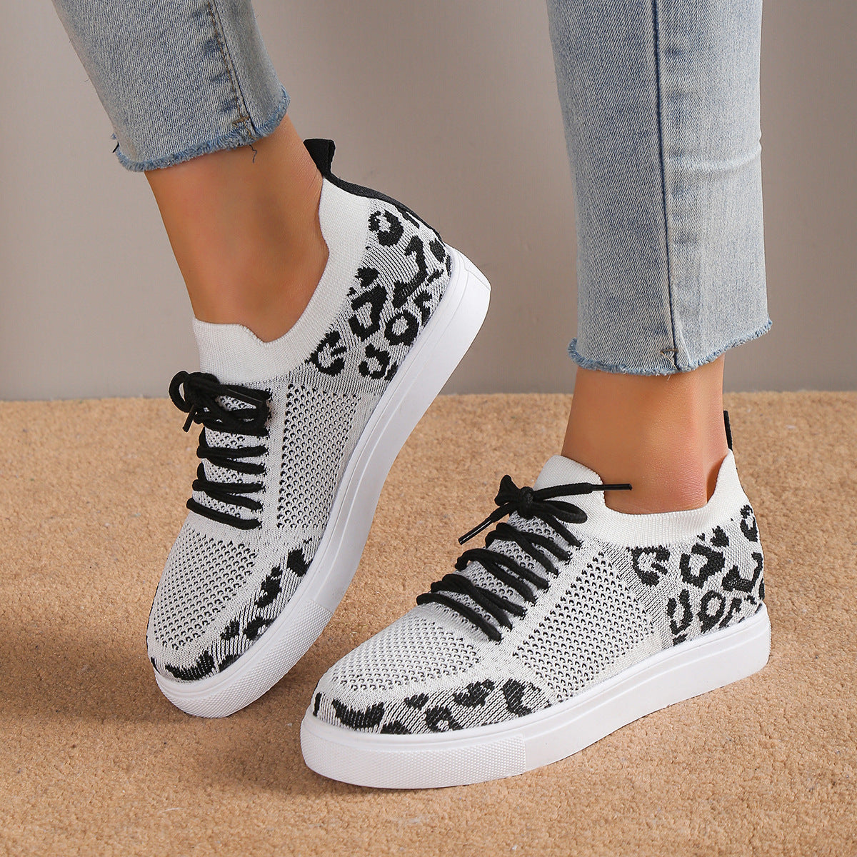 Lace-Up Leopard Flat Sneakers styled for a casual day out, offering comfort and bold style.