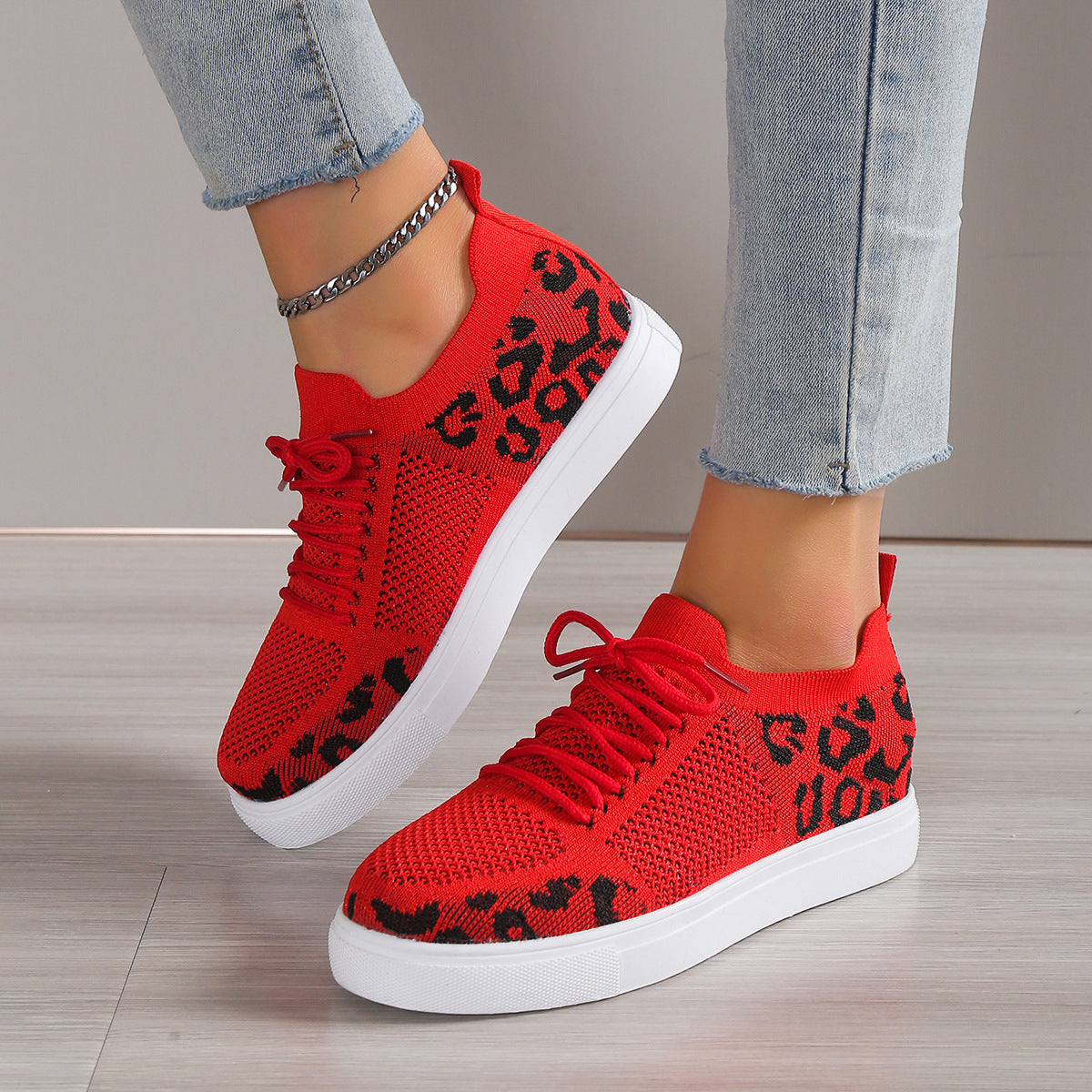 Lace-Up Leopard Flat Sneakers styled with a casual outfit, perfect for adding a wild touch to everyday wear.