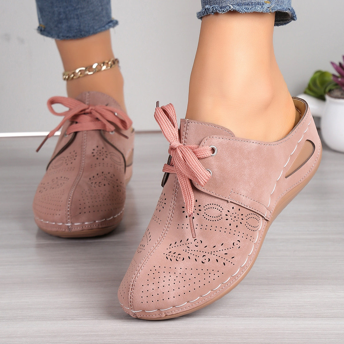 Model wearing Lace-Up Round Toe Wedge Sandals, styled with a summer dress for a trendy look.