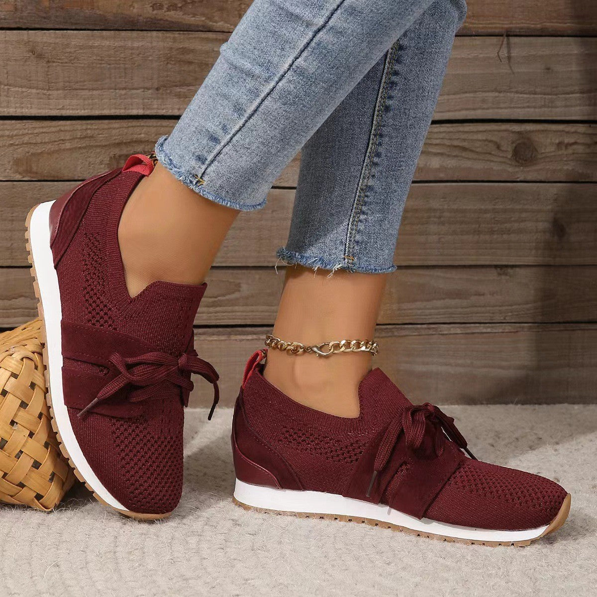 Foot wearing Lace Up Round Toe Woven Athletic Shoes, styled with activewear for a comfortable athletic look.