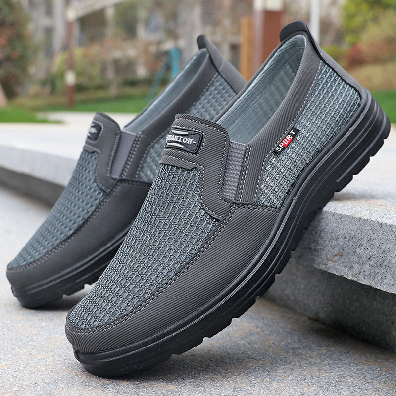 Men's breathable mesh slip-on shoes with a lightweight design.