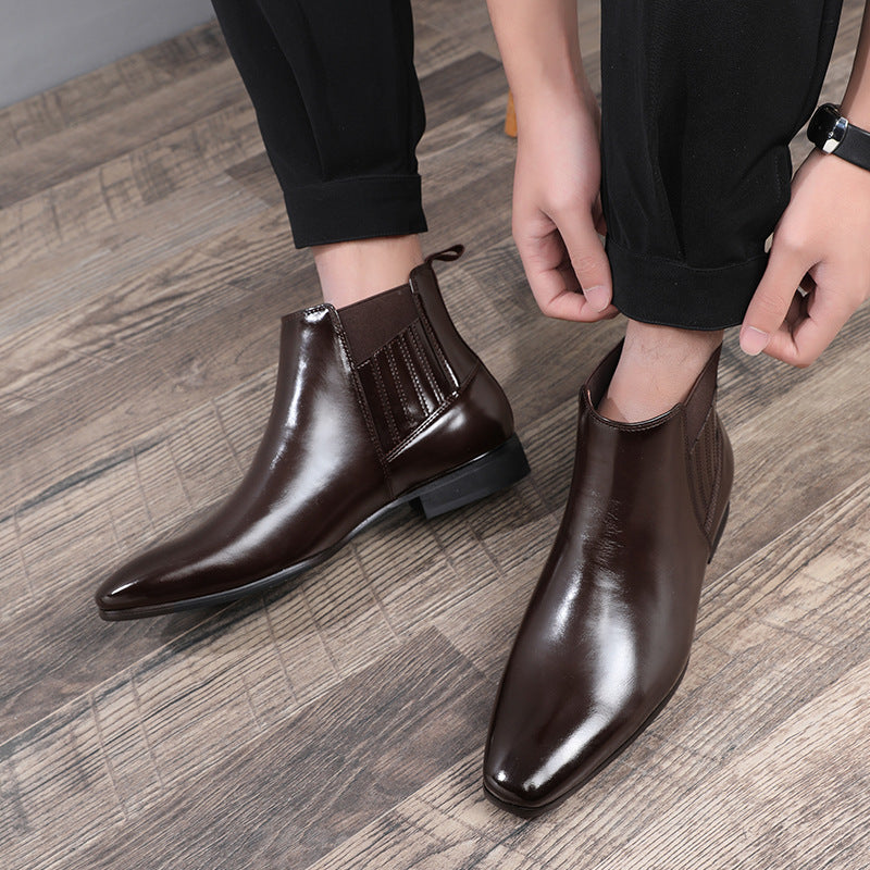 Men's pointed toe high-top Martin boots with a sleek and stylish design.