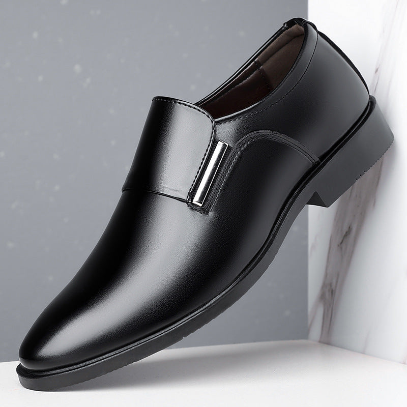 Men's pointed-toe slip-on leather shoes with an elegant design.