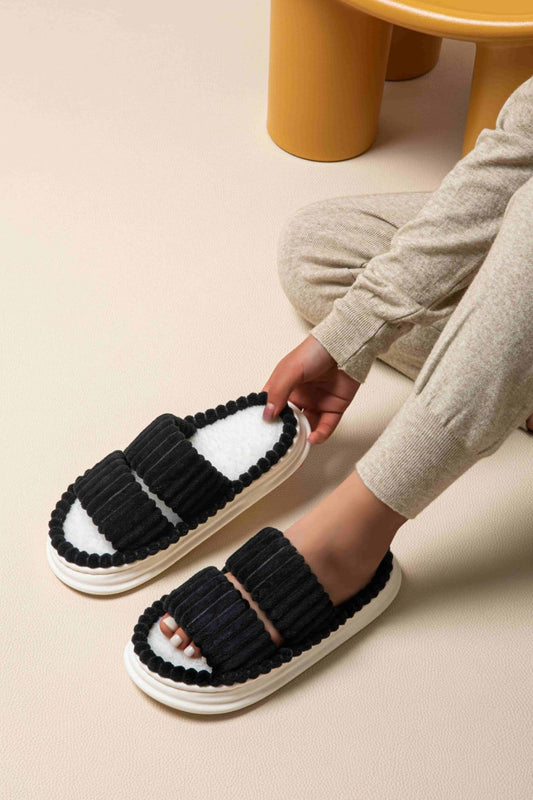 Open Toe Fluff Platform Slippers offering a fashionable look with the combination of soft fluff and trendy platform.