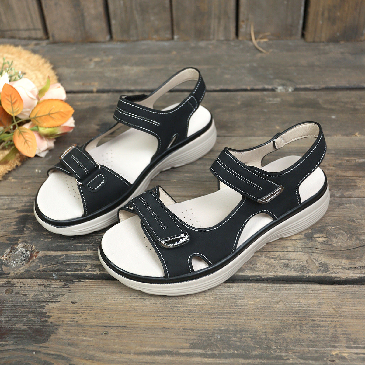  A pair of Peep Toe Platform Sandals, offering comfort and style for any occasion.