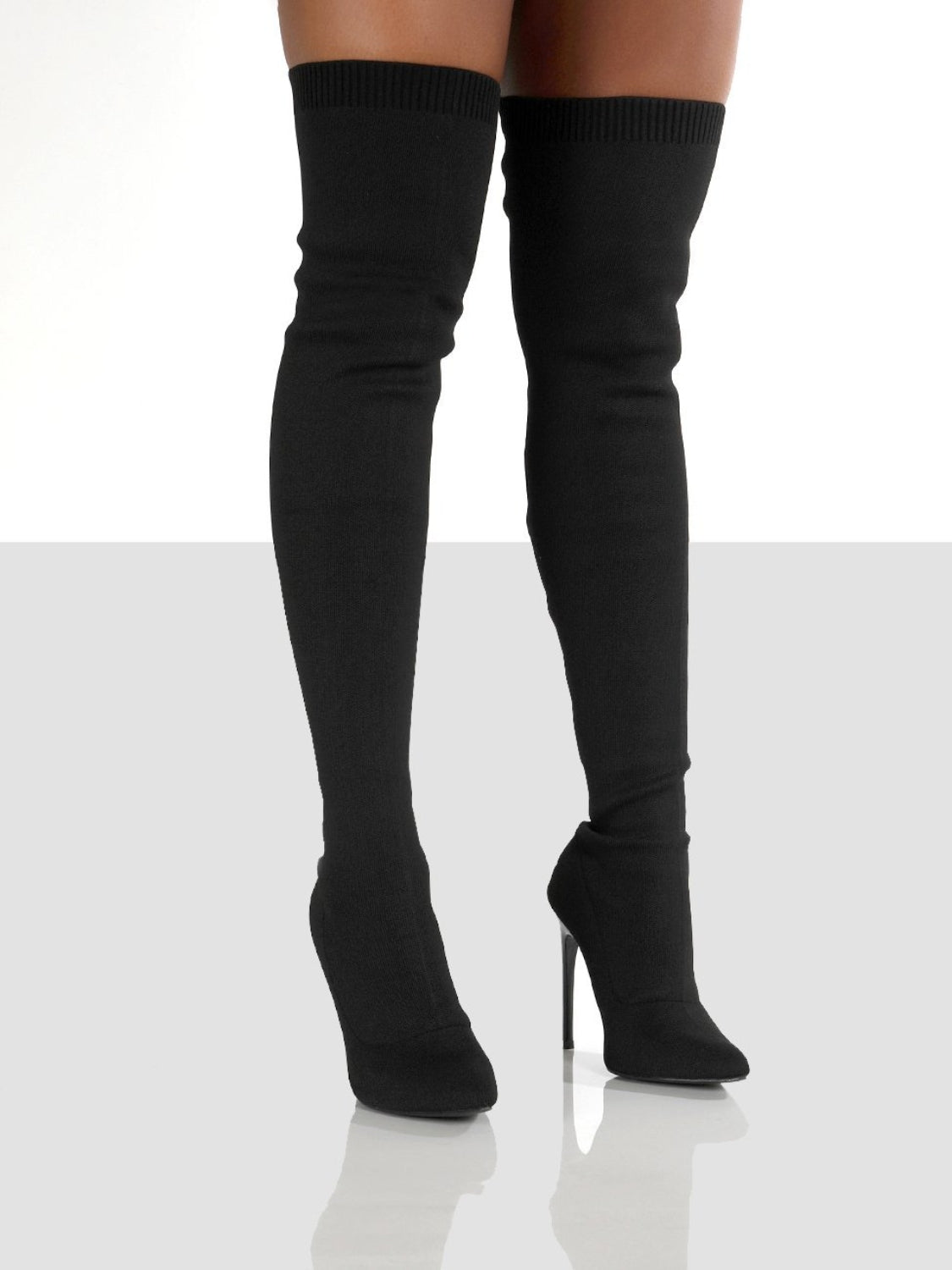 Black Point Toe Over Knee Stiletto Boots for a bold and sexy look.