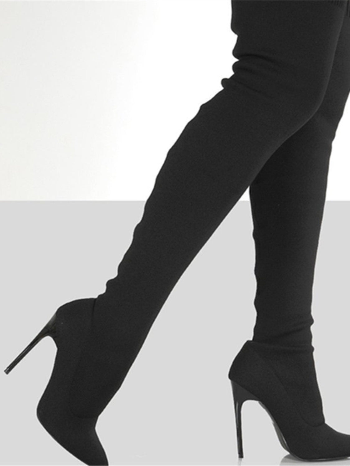 Leather Point Toe Over Knee Stiletto Boots, combining bold style with luxury materials.