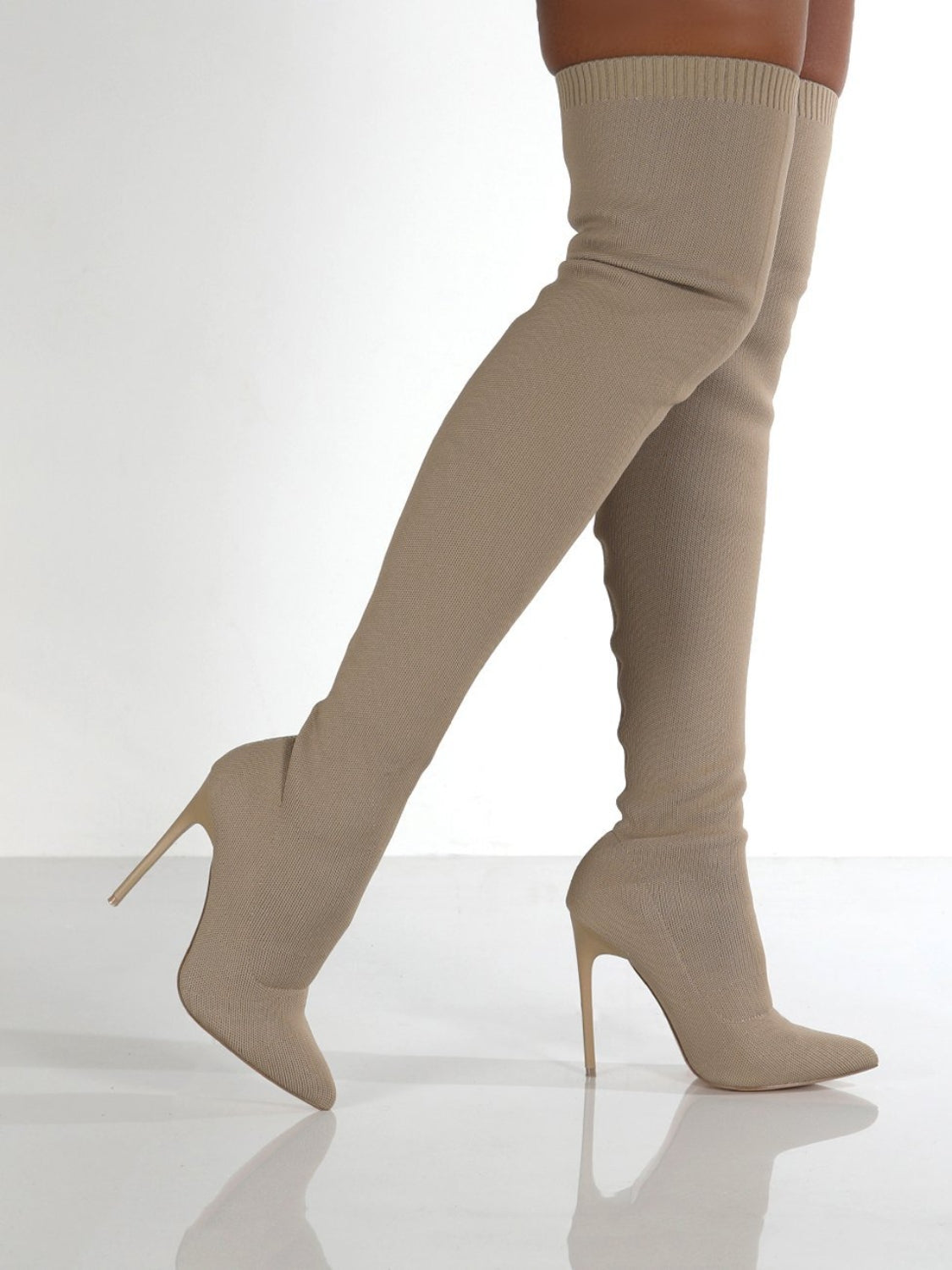 Nude Point Toe Over Knee Stiletto Boots, adding sophistication and versatility to your wardrobe.