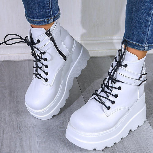 White PU Leather Lace-Up Wedge Boots, offering a neutral and versatile style.