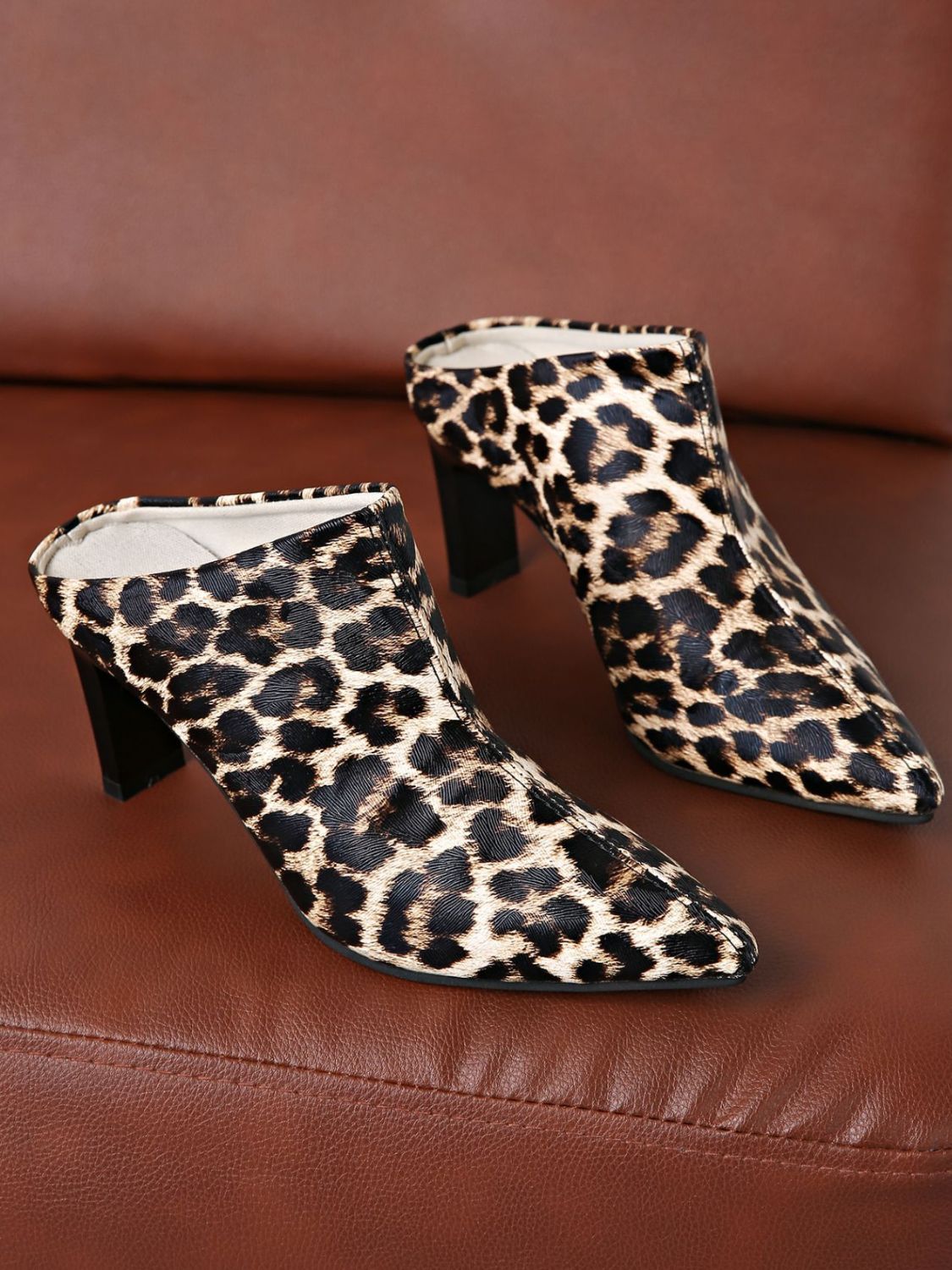 Elegant look with PU Leather Leopard Point Toe Pumps, perfect for evening wear and formal events.