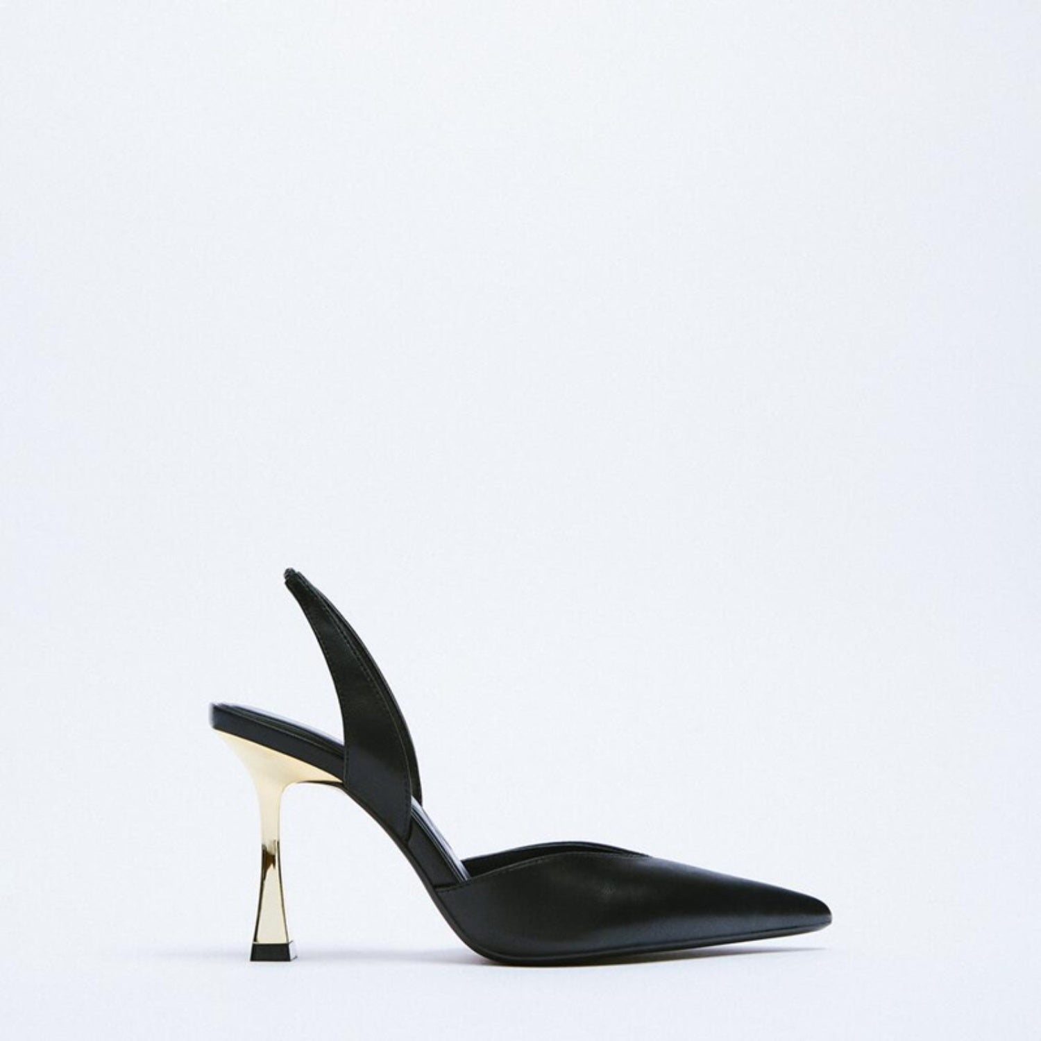 Side view of PU Leather Point Toe Stiletto Heel Pumps, showcasing their sleek design and stiletto heel.