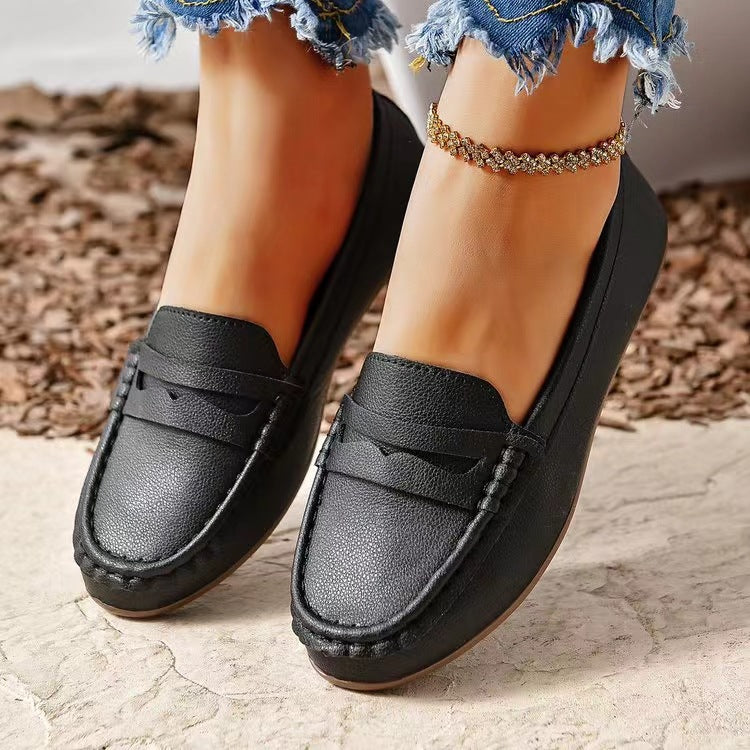 Classic black PU Leather Round Toe Flat Slip-Ons, versatile for any outfit or occasion.