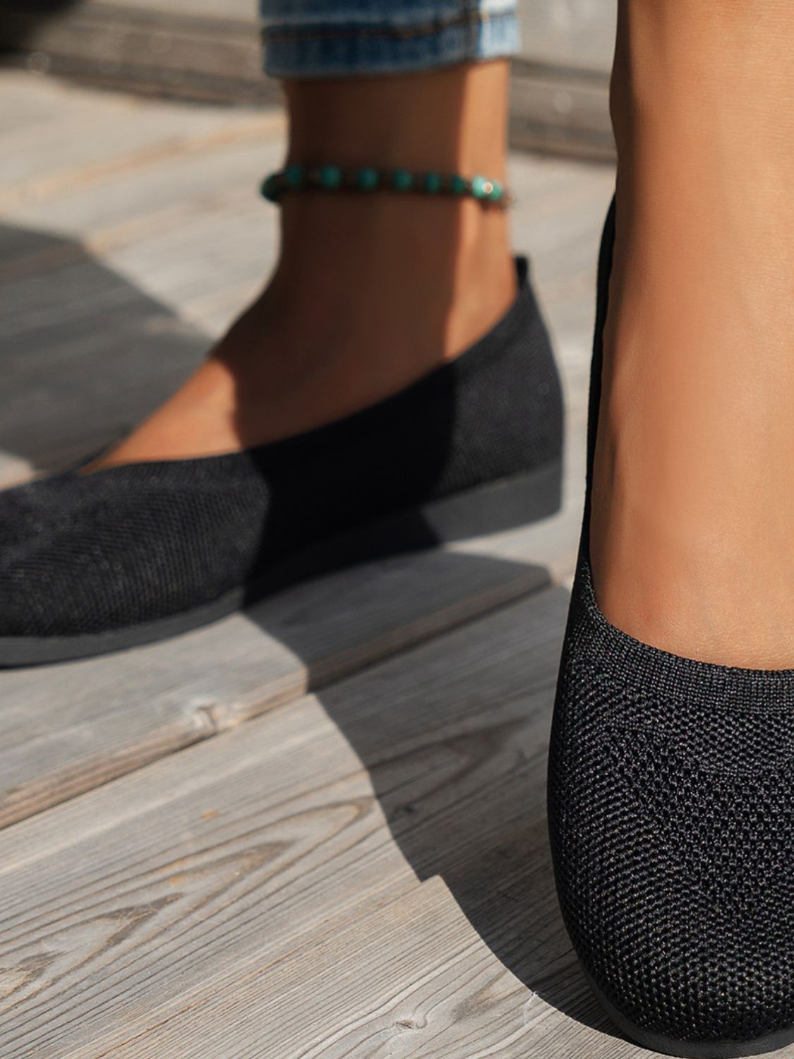 A pair of Round Toe Flat Slip-Ons, versatile for any casual outfit.