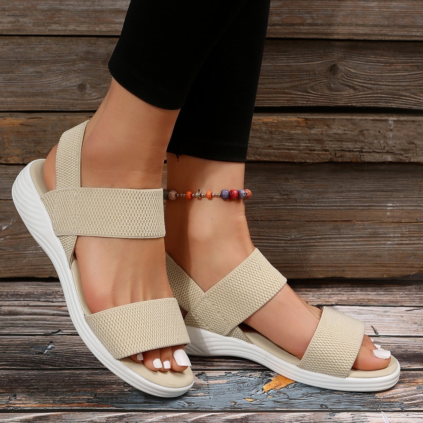 Rubber Open Toe Low Heel Sandals shining in sunlight, perfect for a sunny day outing.