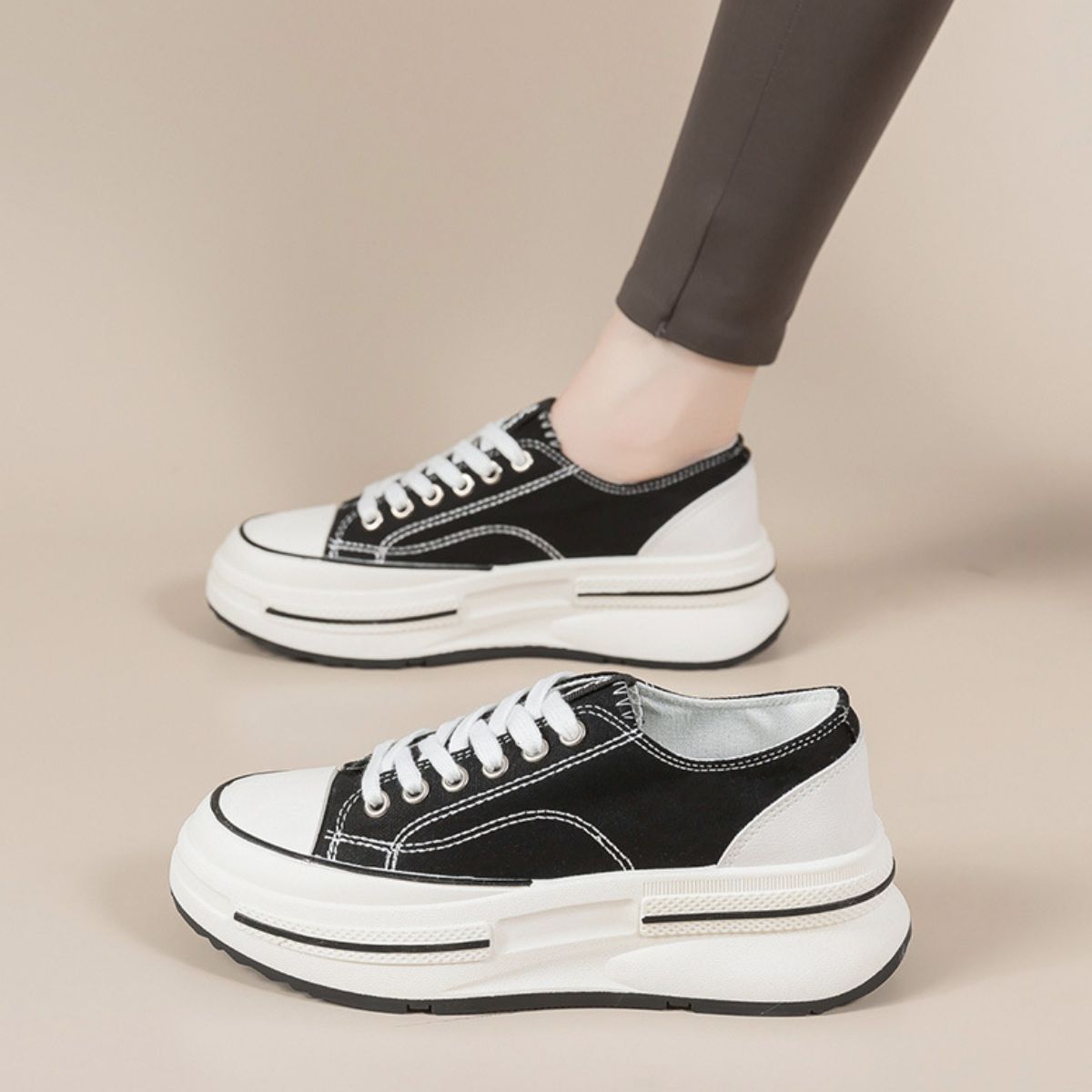 Side view of Tied Round Toe Platform Sneakers, showcasing the trendy platform design.