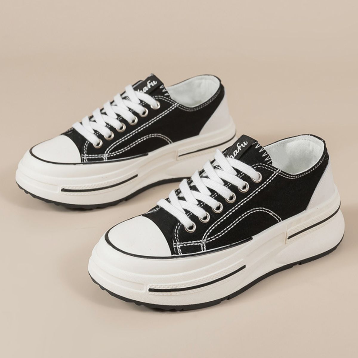 Tied Round Toe Platform Sneakers with chic laces and a stylish platform sole.