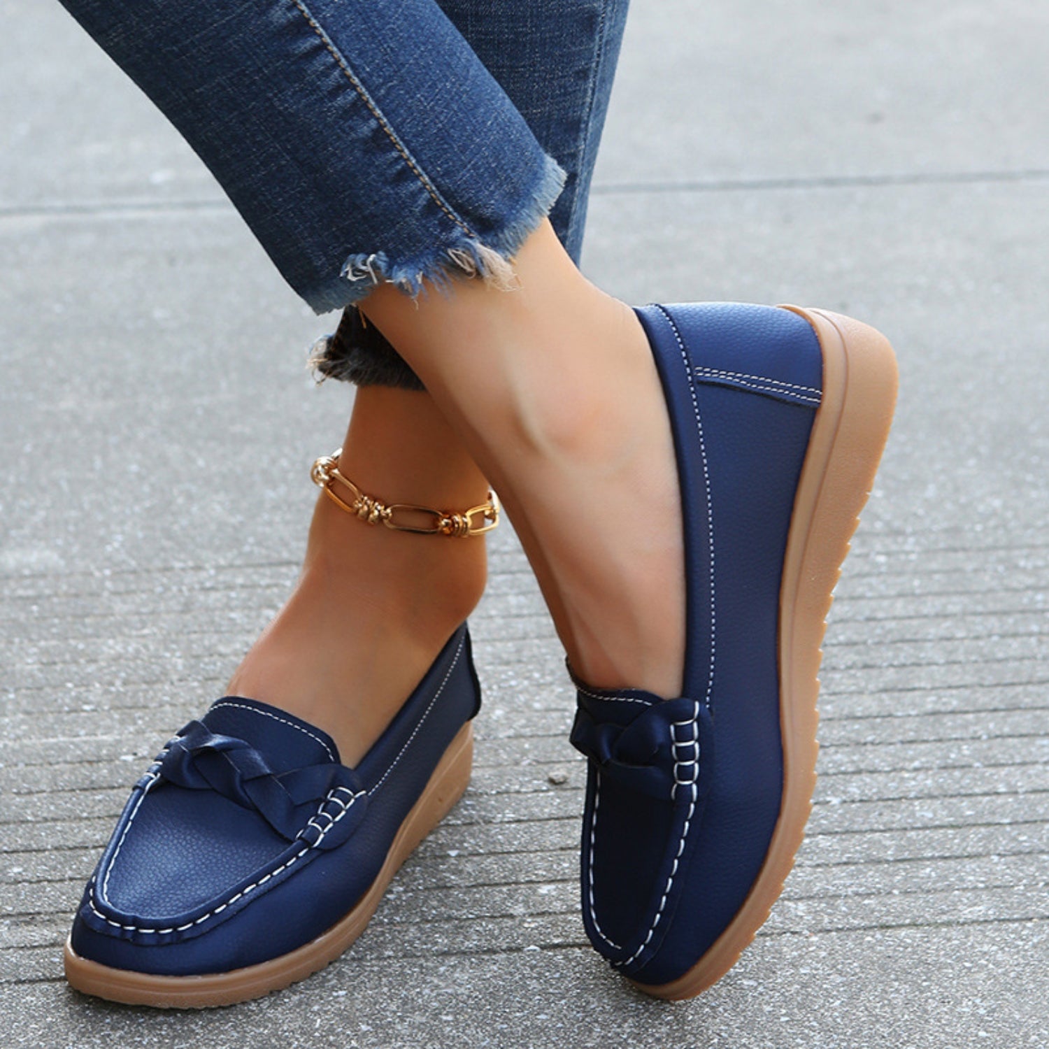 Weave Wedge Heeled Loafers on the pavement, perfect for everyday wear.