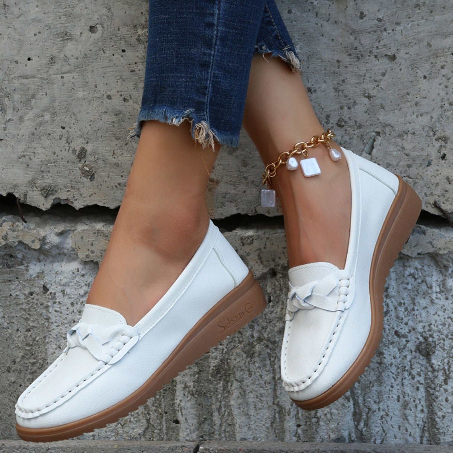 Weave Wedge Heeled Loafers worn with pants for a polished, everyday look.