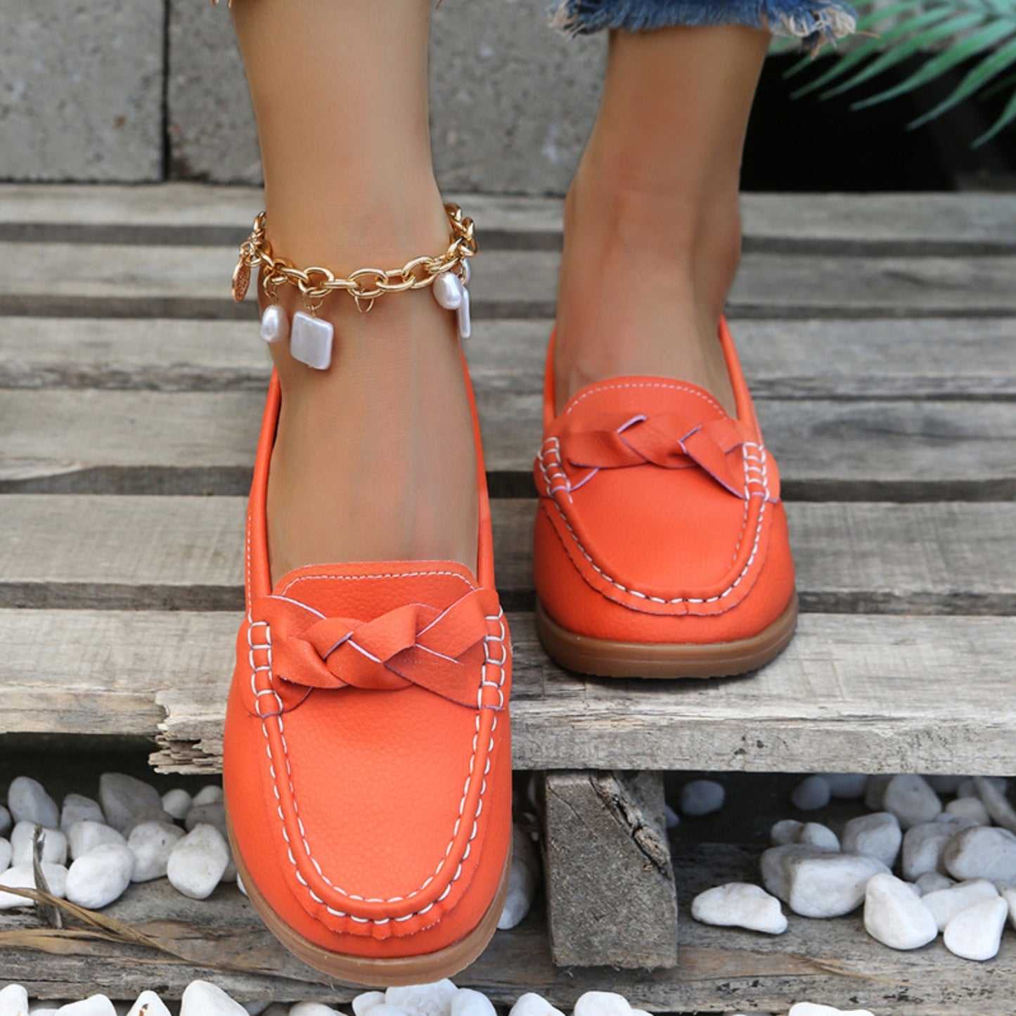 Weave Wedge Heeled Loafers worn on feet, offering stylish and comfortable elevation.