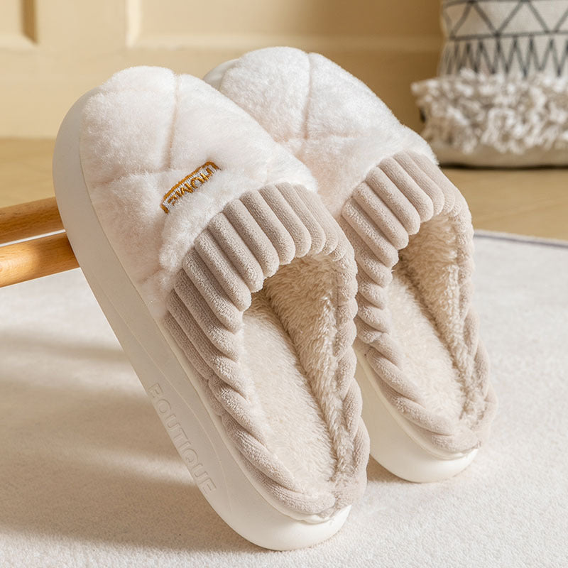 Women's warm plush bedroom slippers with a stylish rhombic design.